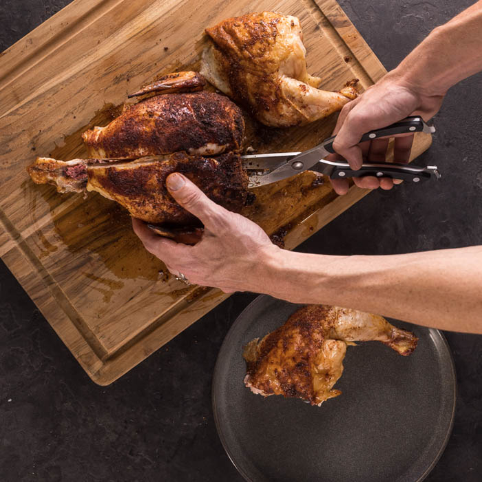 Excellent Poultry Shears cutting chicken for a great men's grilling gift.