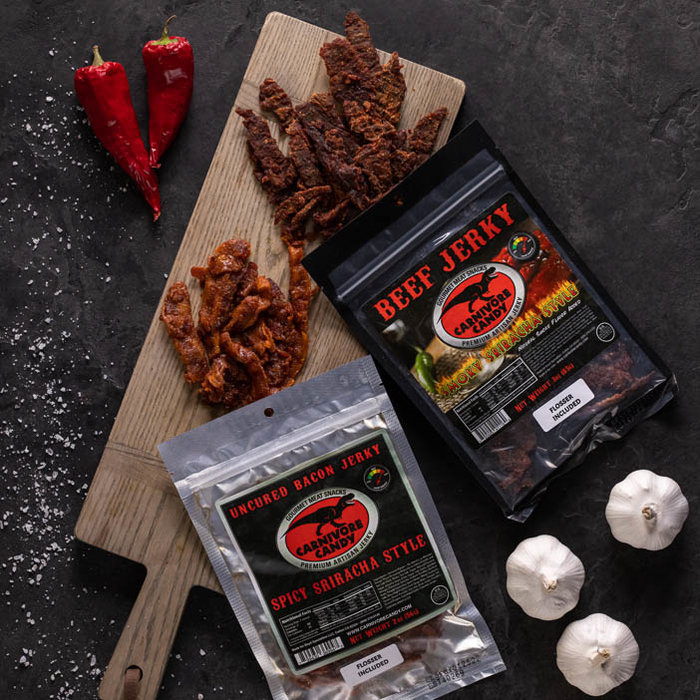 Sriracha flavored jerky on a cutting board for a great men's snack gift.