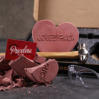 Heart shaped brick broken to see gift card inside for men.