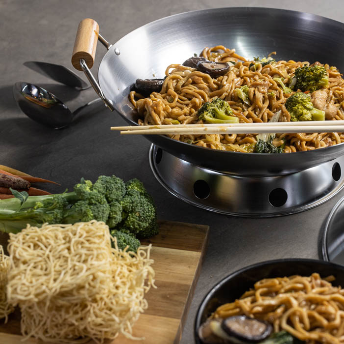 Wok filled with stir fry and noodles are a great men's cooking gift.